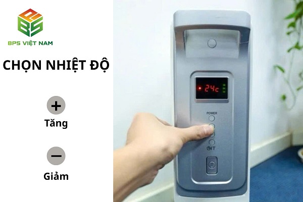 Sử dụng hai nút “+” và “-” trên máy sưởi dầu để tăng/ giảm nhiệt độ